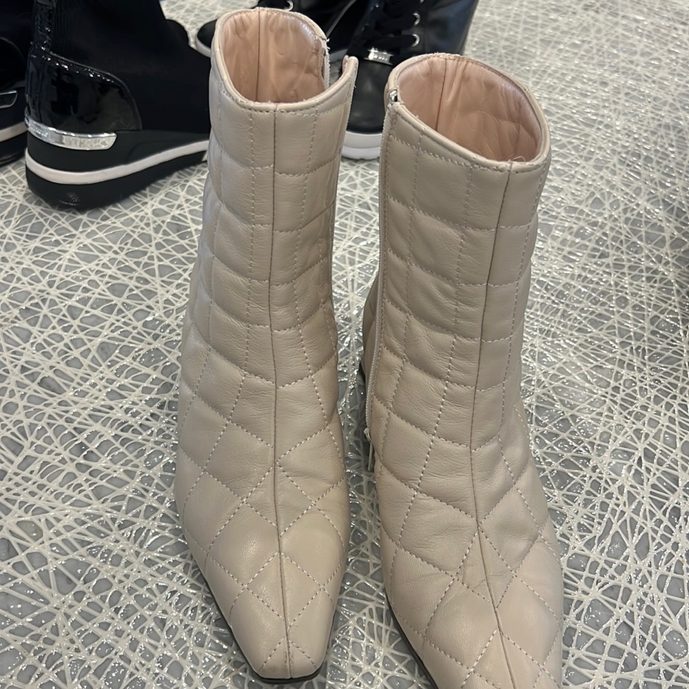 Cream colored zip up boots